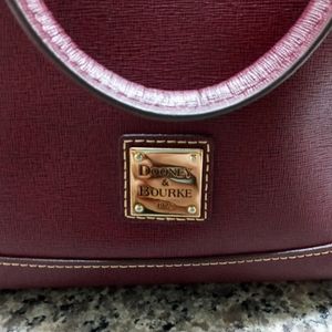 BURGUNDY DOONEY AND BOURKE HANDBAG